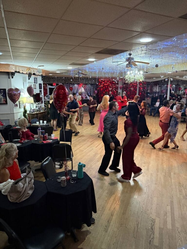 Couple dancing romantic ballroom dance at Valentine’s Day party Sarasota 2026