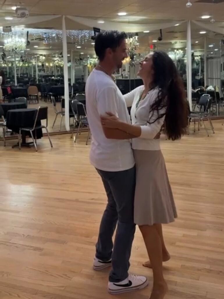 Engaged couple having fun during wedding dance practice at Dance Treat Sarasota